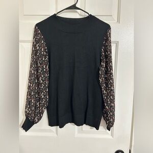 Chic Black Sweater with Floral Sleeves
